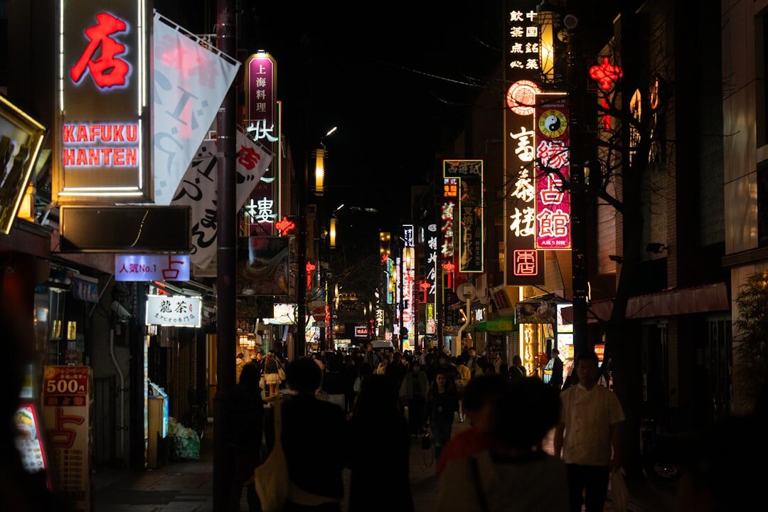 crowded city street at night